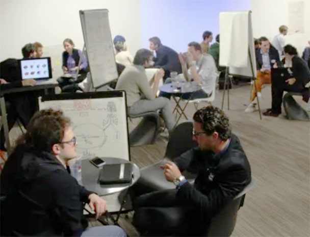 Several people in a room at the launch of the starter program