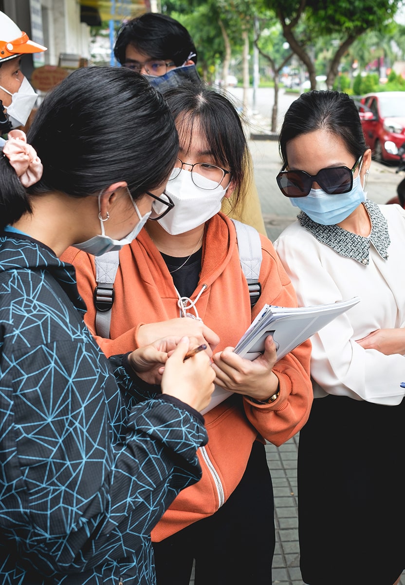 Students collaborating together on the streets in Vietnam